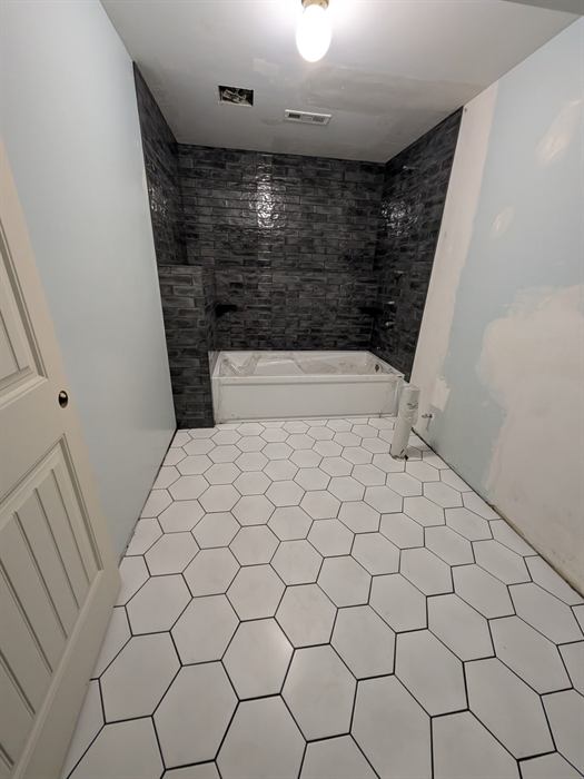 Tiled bathroom by Mid-State Tile Company